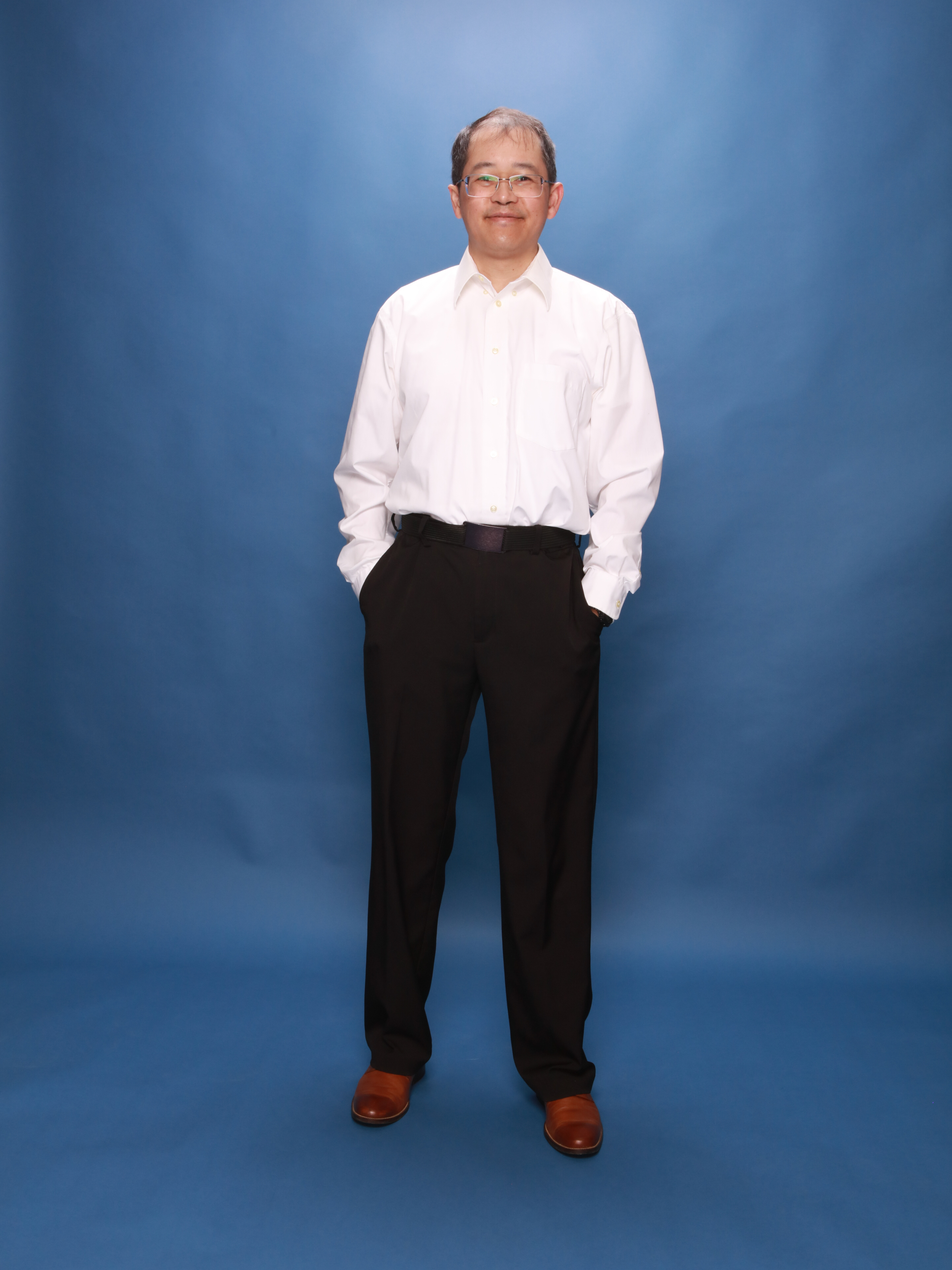 Henry Nguyen standing in a casual stance.